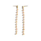 luxe Essence K18ロングピアス オレンジサファイア