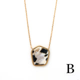 l'unique ネックレス